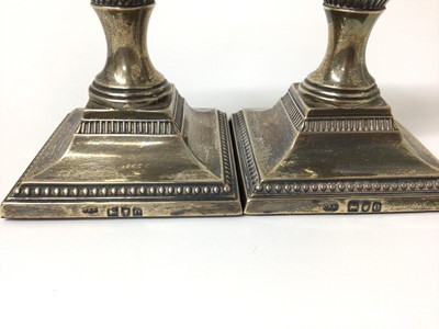 Lot 161 - Pair Victorian silver Adam-style squat candlesticks on square bases ( London