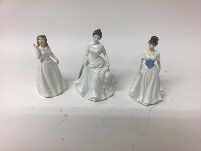 Lot 1172 - Nine Royal Doulton figures - Winter's Day HN4589, Autumn Stroll HN4588, Christmas Day HN3488, With Love HN3393, Harmony HN4096, Joy HN3875, Amanda HN3635, Welcome HN3764 and Melody HN4117