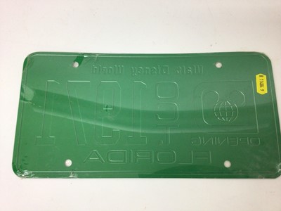 Lot 2475 - Rare Walt Disney memorabilia - a Walt Disney World license plate with the opening date Oct 1971, still in original wrapping, bought at the opening by the vendor