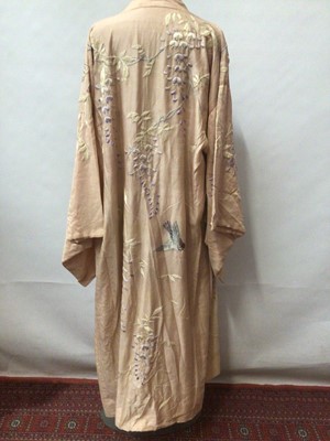 Lot 2114 - Japanese handmade pink silk kimono embroidered with wisteria flowers in satin stitch.  Plus a 1930's pink kimono.