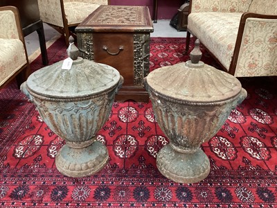 Lot 1415 - Pair of cast iron urns and covers