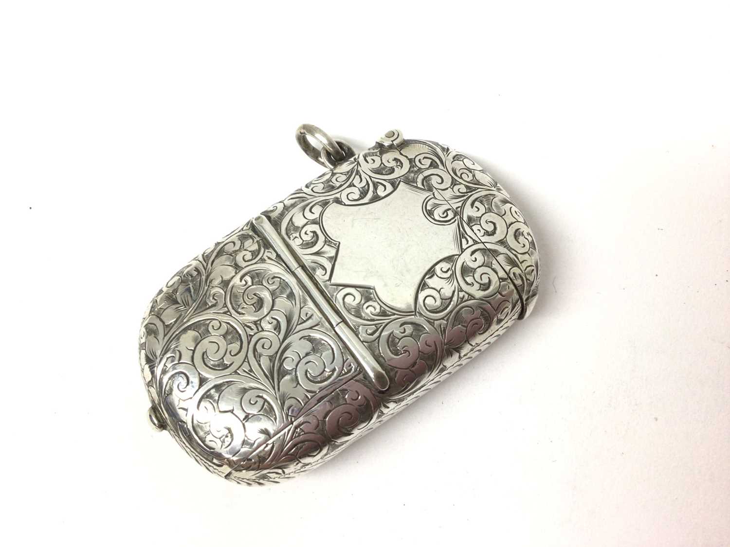 Lot 174 - Large late Victorian silver combination vesta and sovereign case with two fitted toothpicks, floral engraved decoration (Chester 1894) 6.2 x 4cm