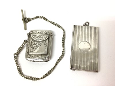 Lot 175 - Edwardian silver combination vesta and stamp case with floral engraved decoration ( Birmingham1906) 4.5 cm and silver envelope stamp case (Birmingham 1912) 6cm (2)