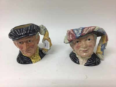 Lot 1180 - Two Royal Doulton character jugs - Pearly Queen D6759 and Pearly King D6760