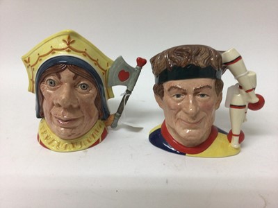 Lot 1187 - Six Royal Doulton character jugs - The Juggler D6835, The Red Queen D6777, The Cook & The Cheshire Cat D6842, Leprechaun D6847, Santa Claus D6668 and Veteran Motorist D6633