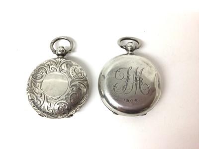 Lot 179 - Two Edwardian silver sovereign cases with engraved decoration