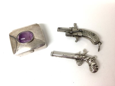 Lot 181 - Victorian silver novelty pistol propelling pencil by S. Morden 6 cm(open), novelty Pinfire watch chain pistol and silver pill box  (3)