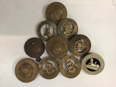 Lot 728 - Group of Victorian and later blue cloth helmet plate regimental badges (some copies noted)