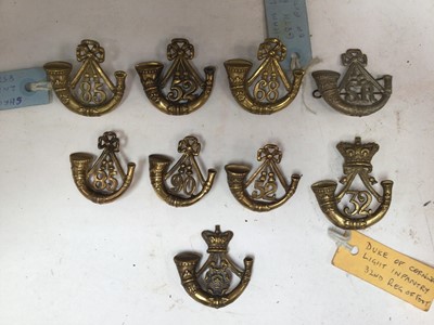 Lot 729 - Group of nine Victorian and later Light Infantry and other regimental badges (some copies noted).