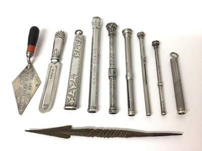 Lot 187 - Lot Victorian silver propelling pencils, silver knife novelty book marker, minature silver trowel and an arrow head (10)