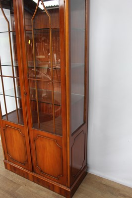 Lot 142 - Antique-style yew display cabinet with astragal glazed doors, 89cm wide x 39cm deep x 202cm high