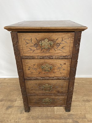 Lot 143 - Chinese-style carved chest of four drawers, the sides carved with bamboo decoration, 51cm square x 82cm high