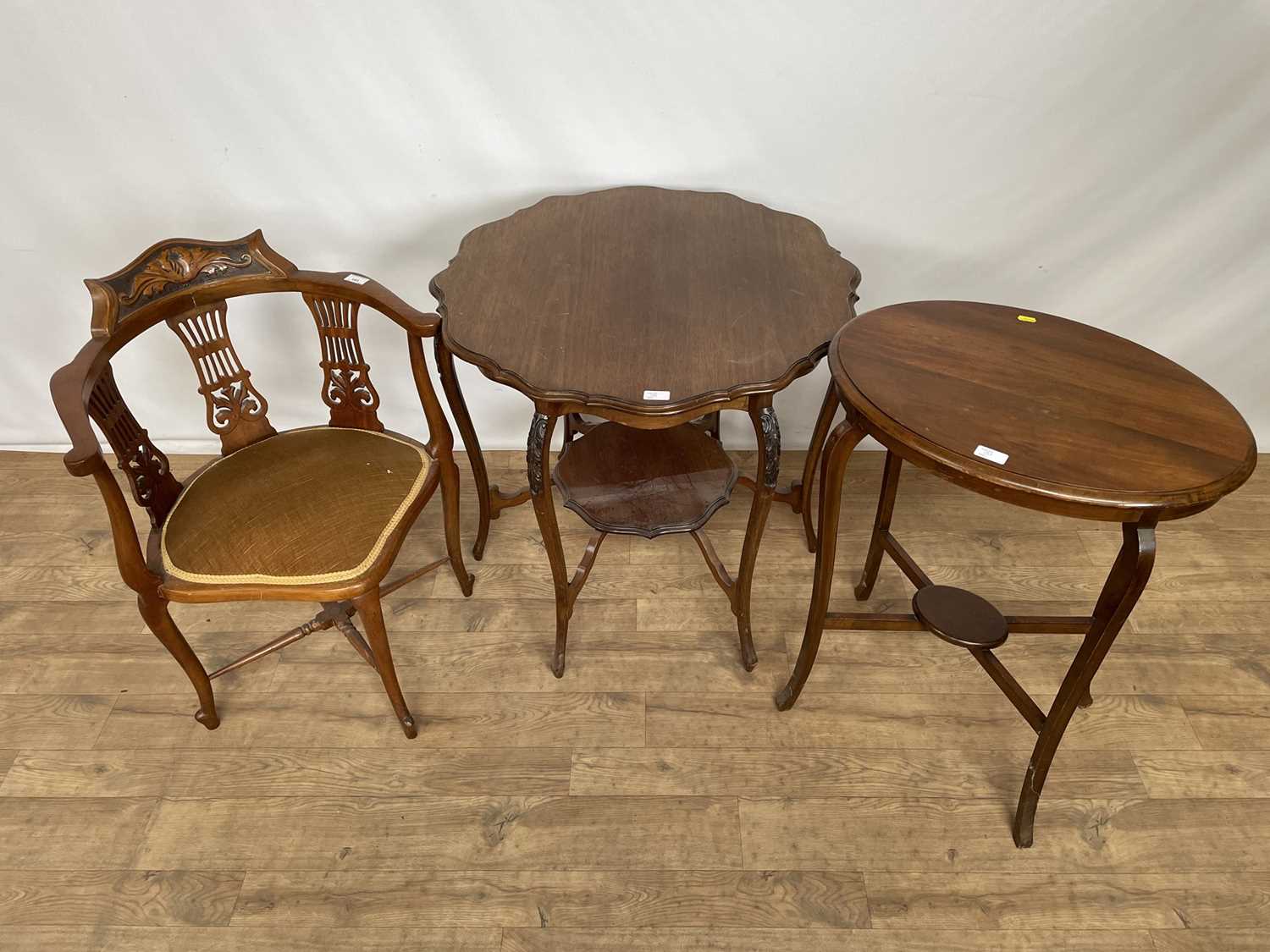 Lot 151 - Edwardian corner chair and two Edwardian two tier tables (3)