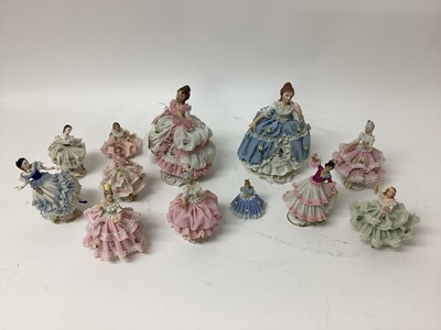 Lot 1317 - 12 Dresden ladies in frilly dresses