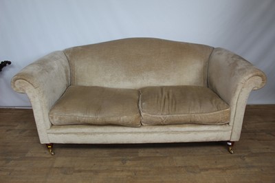 Lot 161 - Contemporary camel back sofa on brass castors