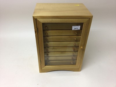 Lot 2473 - Collectors cabinet with nine drawers, 38cm high