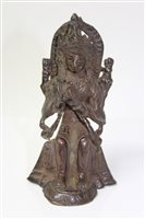 Lot 938 - 19th century Chinese bronze deity figure in...