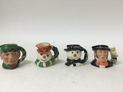 Lot 1220 - Seven Royal Doulton character jugs - Santa Claus D6900, Mrs Claus D6922, Snowman D6972, Elf D6942, The Angel D7051, The Caroler D7007 and Snowman D7962