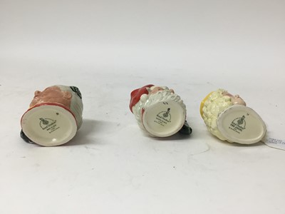 Lot 1220 - Seven Royal Doulton character jugs - Santa Claus D6900, Mrs Claus D6922, Snowman D6972, Elf D6942, The Angel D7051, The Caroler D7007 and Snowman D7962