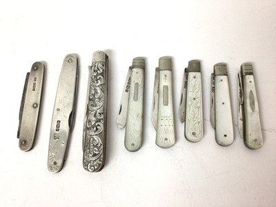 Lot 205 - Eight silver mounted pocket/fruit knives including silver floral scroll decorated example