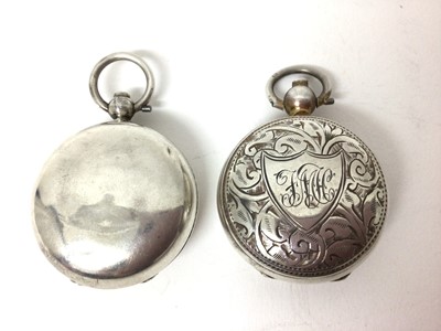 Lot 217 - Two Edwardian silver sovereign cases, one with foliage engraved decoration (2)