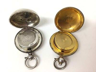 Lot 217 - Two Edwardian silver sovereign cases, one with foliage engraved decoration (2)