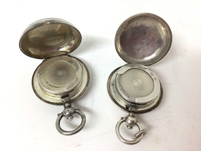 Lot 219 - Two Edwardian silver sovereign cases, one plain and one engine turned (2)