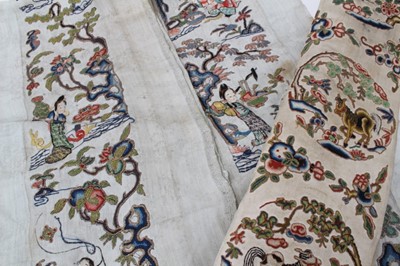 Lot 2129 - Three Chinese embroidered sleeve panels, hand embroidered in forbidden stitch and satin stitch.