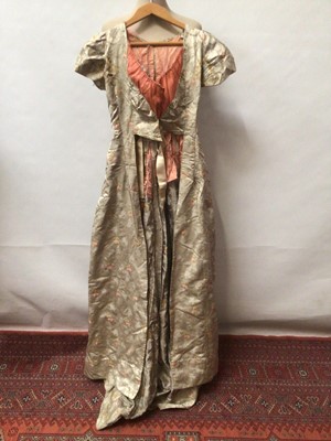 Lot 2130 - Early 19th century silk brocade dress with fitted and boned bodice and skirt open at front ..