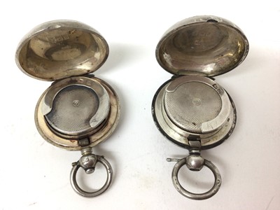 Lot 221 - Two silver sovereign cases, one floral engraved, the other engine turned (2)