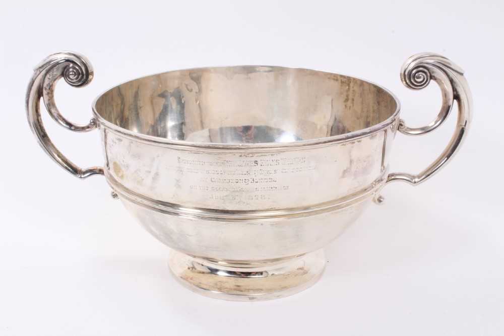 Lot 204 - Large Edwardian twin handled silver rose bowl.