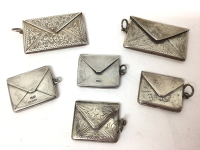 Lot 228 - Six early 20th century and later silver envelope-shaped stamp cases