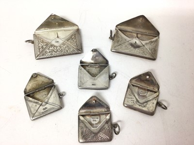 Lot 228 - Six early 20th century and later silver envelope-shaped stamp cases