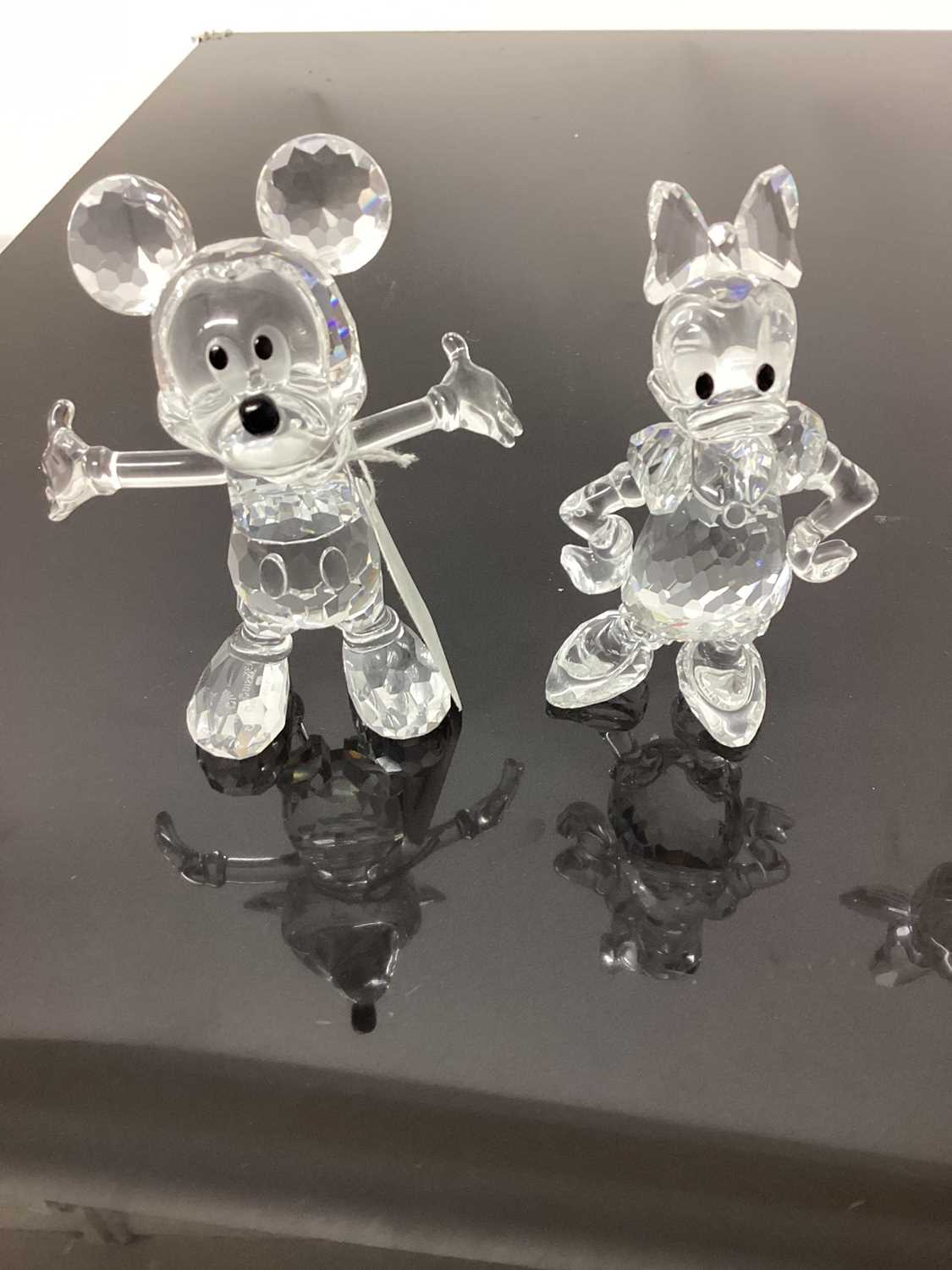 Lot 1254 - Three Swarovski crystal Disney figures 