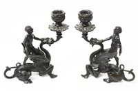 Lot 955 - Pair of Grand Tour candlesticks of figures on...