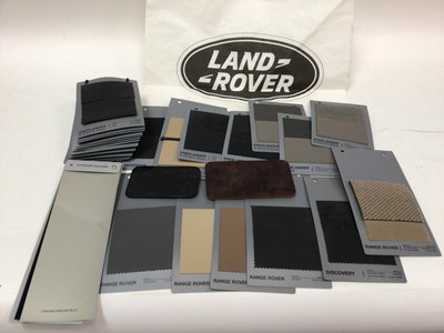 Lot 1971 - Collection of Land Rover dealership paint and trim sample cards for various models including Defender, Discovery and Freelander, together with two Land Rover branded paper floor mats (1 box)