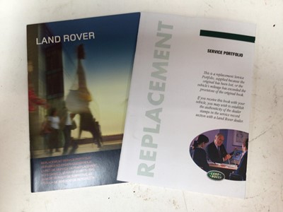 Lot 1964 - Two unused Land Rover replacement service portfolios / books, one dated 2001 (2)