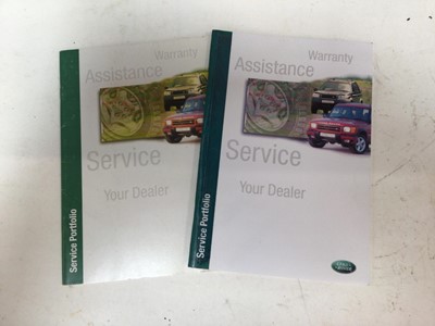 Lot 1963 - Two unused Land Rover service portfolios / books, one dated 2001 (2)