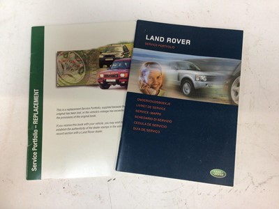 Lot 1961 - Two unused Land Rover replacement service portfolios / books, dated 1999 and 2003 (2)