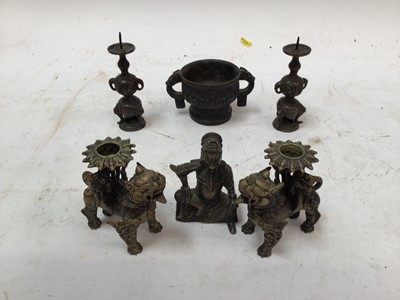 Lot 2486 - Chinese bronze censer, together with a Chinese bronze figure, a pair of Tibetan foo dog candlesticks and a pair of Japanese bronze pricket candlesticks (9)