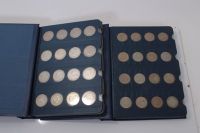 Lot 464 - G.B. - Mixed coinage contained in two coin library's silver and cupro-nickel Shillings, Florins, Half Crowns and Crowns (Qty)