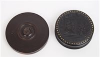 Lot 965 - Victorian bois durci pressed circular snuff...