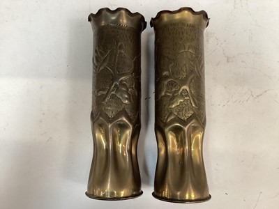 Lot 760 - Two First World War brass trench art shell cases, together with a group of cap badges and coronation medallions.