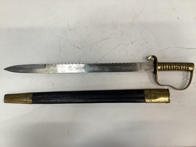 Lot 858 - Victorian 1856 Pattern Pioneer Corps sword with brass ribbed hilt, broard saw backed blade, in brass mounted leather scabbard, dated 1888 and Regimental marks to crossguard