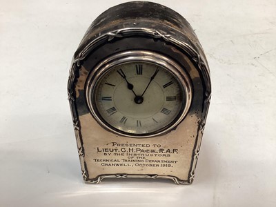 Lot 761 - Edwardian silver mounted desk clock (Birmingham 1906), with later engraved presentation inscription, 'Presented to Lieut. G. H. Pack. R.A.F. by the Instructors of the Technical Training Department,...