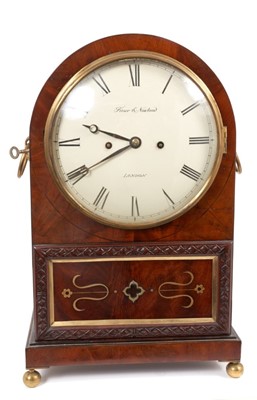 Lot 655 - Regency mahogany and brass inlaid arched bracket clock