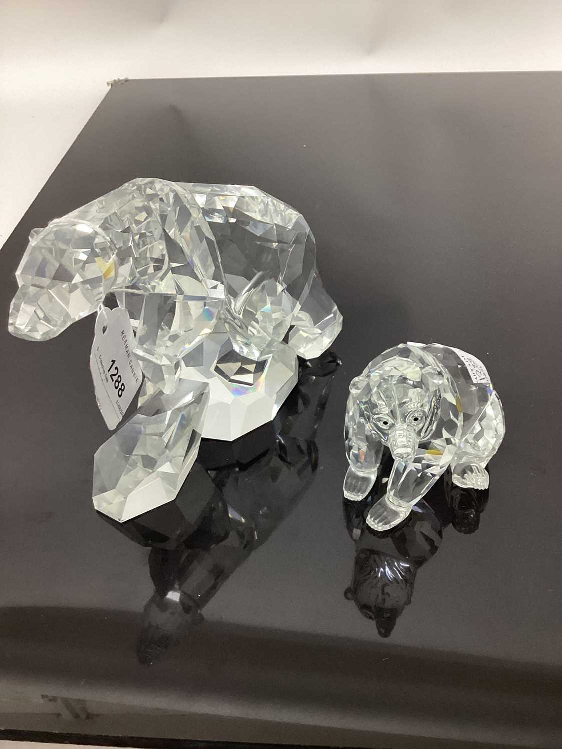 Lot 1288 - Five large Swarovski animals - Buffalo, Eagle, Dog, Polar Bear and another Bear