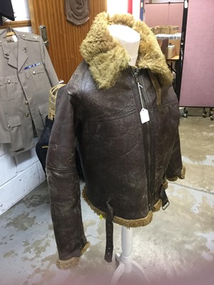 Lot 770 - Second World War RAF brown leather and sheepskin flying jacket, with brass zips and fitting, stamped with the Air Ministry mark- A.M. F. F. Ltd, original label to interior.