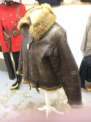 Lot 770 - Second World War RAF brown leather and sheepskin flying jacket, with brass zips and fitting, stamped with the Air Ministry mark- A.M. F. F. Ltd, original label to interior.