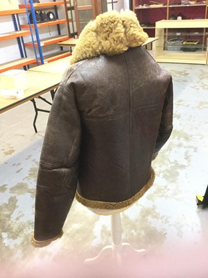 Lot 770 - Second World War RAF brown leather and sheepskin flying jacket, with brass zips and fitting, stamped with the Air Ministry mark- A.M. F. F. Ltd, original label to interior.